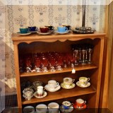 K13. Tea cups and stemware.
